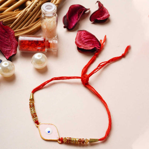 Pink Diamond-Shaped Evil Eye Thread Rakhi - Uncommongifts.in