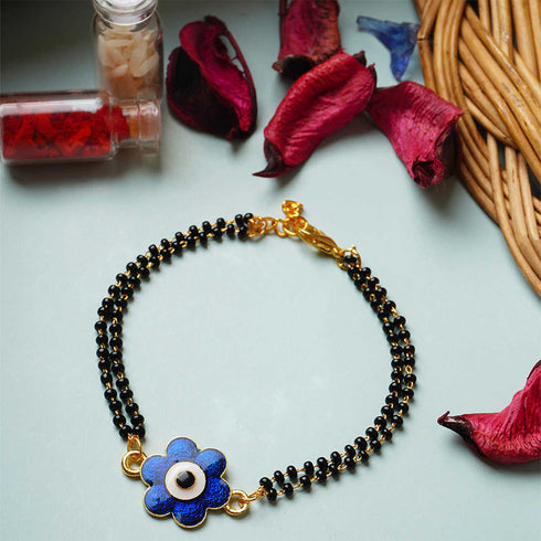 Dark Blue Floral Evil Eye Mangalsutra Beads Rakhi - Uncommongifts.in