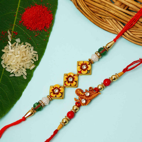 Shri Ganesh & Flower Meenakari Rakhi Set of 2 - Uncommongifts.in