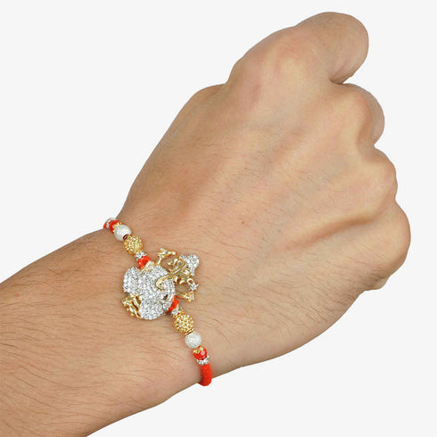 Crystal Embellished Shri Ganesh Religious Rakhi - Uncommongifts.in