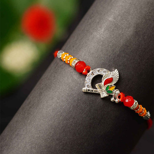 Bansuri Damroo Religious Rakhi - Uncommongifts.in