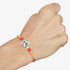 Bansuri Damroo Religious Rakhi - Uncommongifts.in