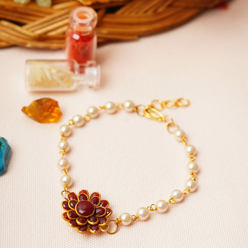 Red Flower Pearl Rakhi - Uncommongifts.in