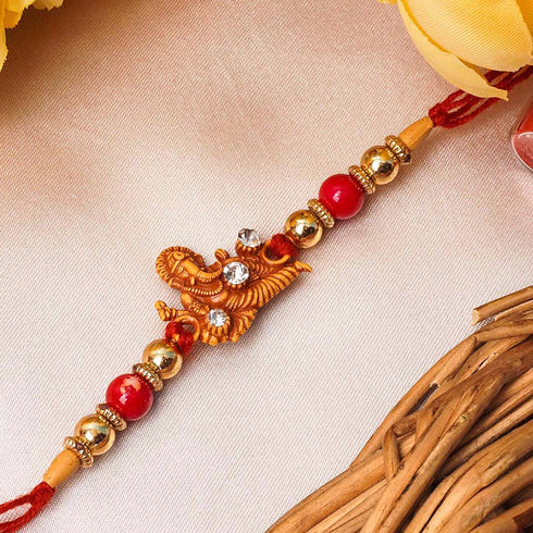 Gold Ganpati Religious Motif Rakhi - Uncommongifts.in