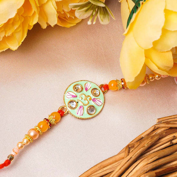 Om Mint Green Crystal Rakhi - Uncommongifts.in