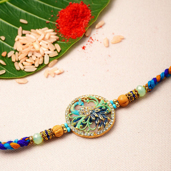 Blue Hued Peacock Mandala Rakhi - Uncommongifts.in