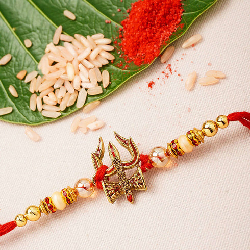 Red Beaded Trishool Damroo Rakhi - Uncommongifts.in