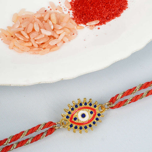 Blue & Red Crystal Spiked Evil Eye Rakhi - Uncommongifts.in