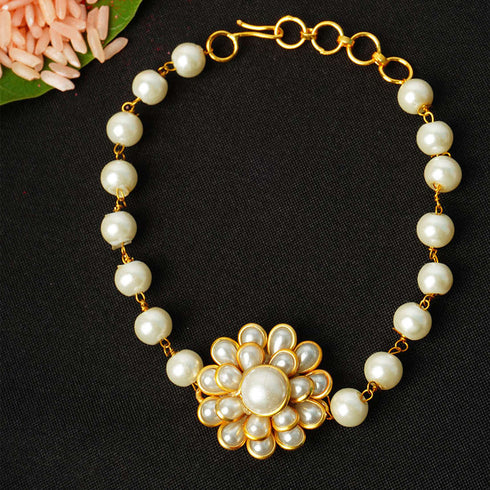 Gold Bordered White Pearl Floral Rakhi - Uncommongifts.in