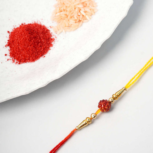 Minimalist Red Bead Thread Rakhi - Uncommongifts.in
