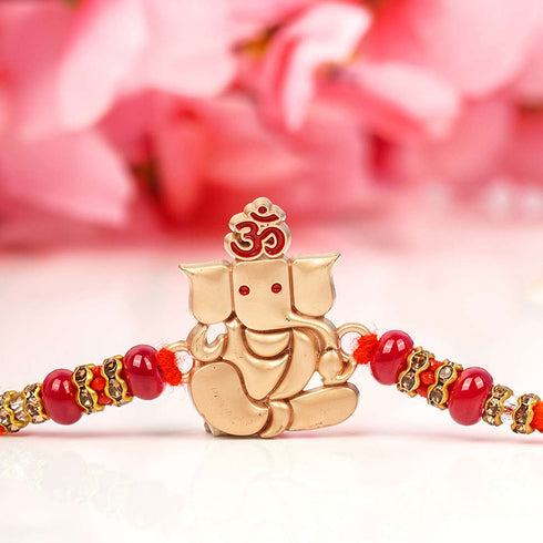 Red Beaded Gold Ganesh Ji Rakhi - Uncommongifts.in