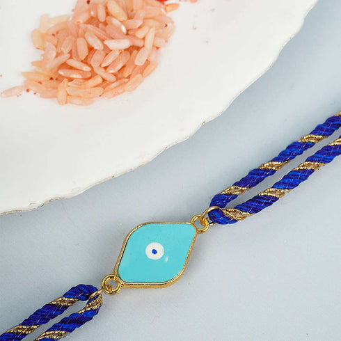 Sky Blue Diamond Shape Evil Eye Rakhi - Uncommongifts.in
